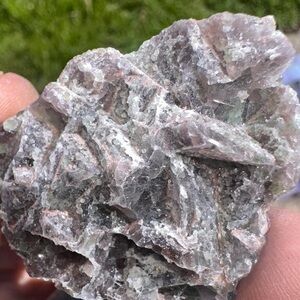 Gray and Pink Layered Mineral Specimen with Metallic Luster